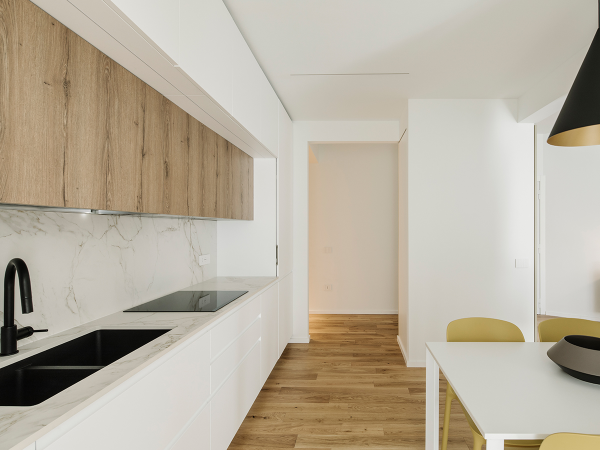 Cucina ADA House progettata da MANCA, con un design elegante e pratico, ideale per creare ambienti cucina moderni.