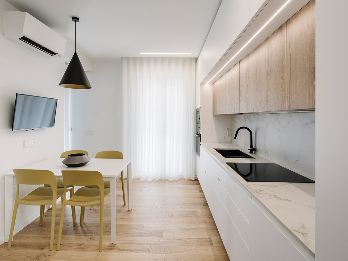 Cucina ADA House progettata da MANCA, con un design elegante e funzionale, ideale per ambienti moderni e pratici.